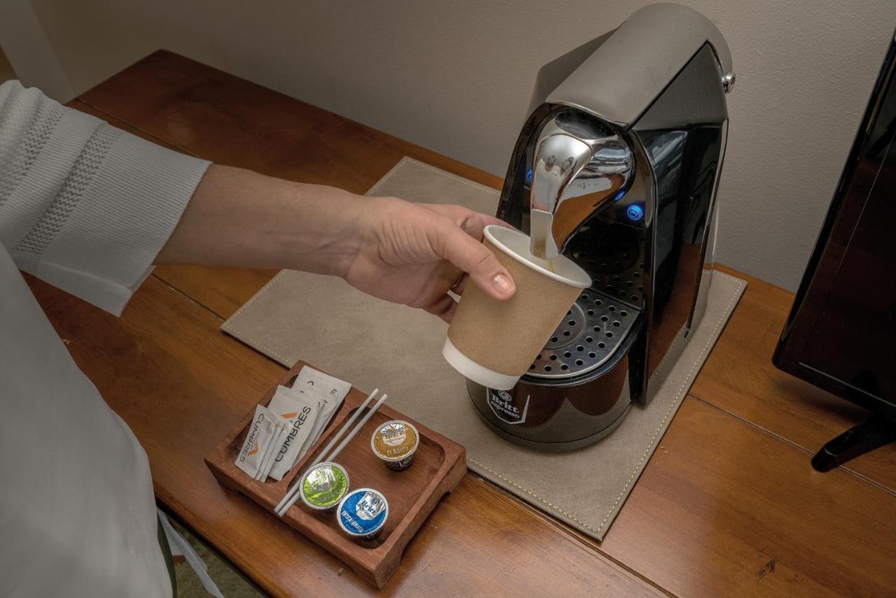 Wyndham Puerto Varas Pettra Luaran gambar A Nespresso coffee machine